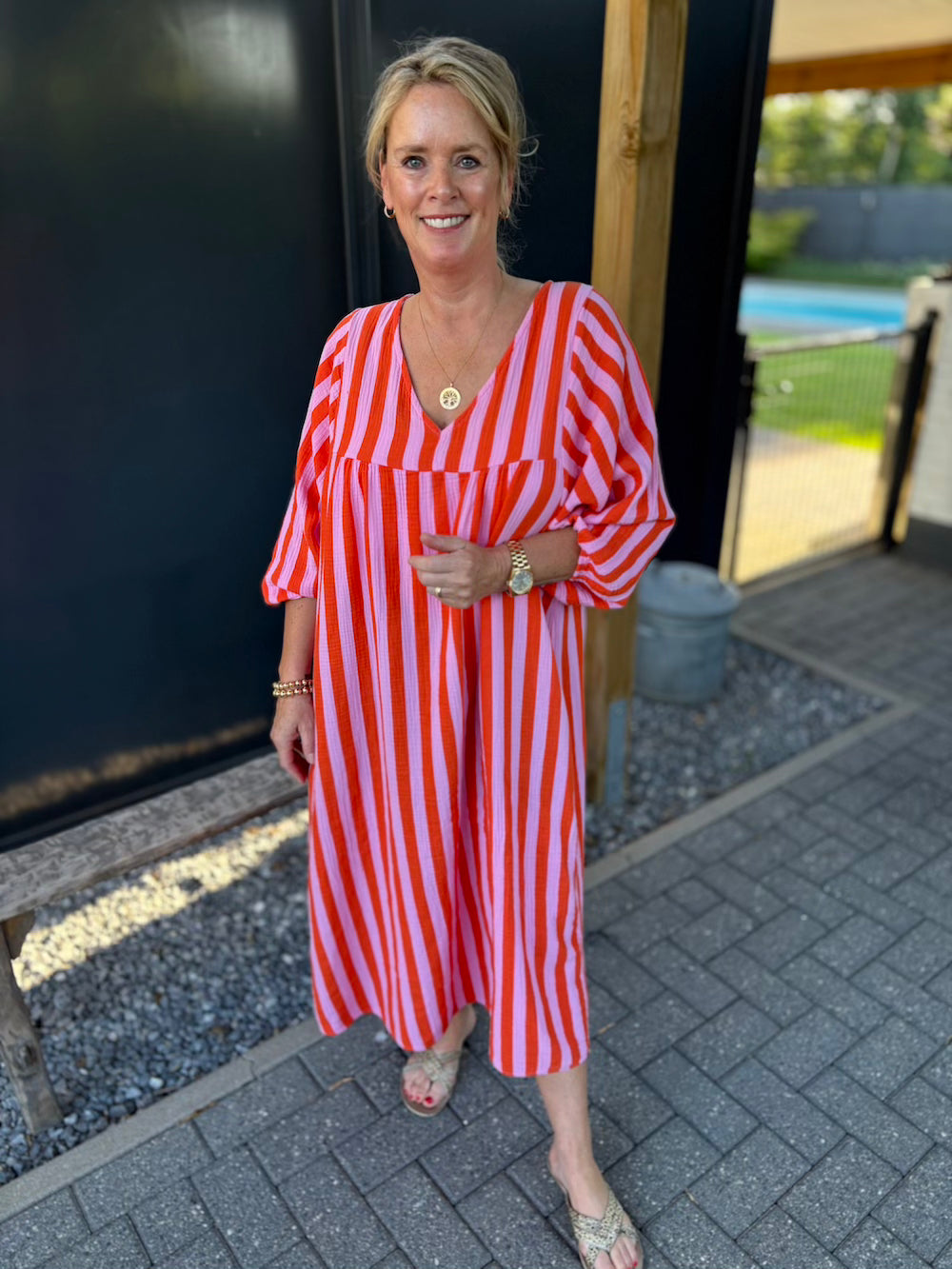 Maxi dress gestreept 3/4 mouw oranje/roze