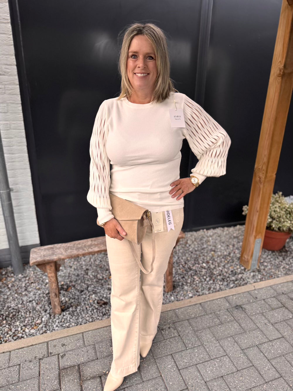 Jeans beige wijde pijp met leuke knopen