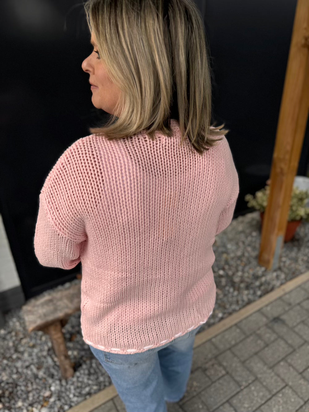 Vest roze met witte details