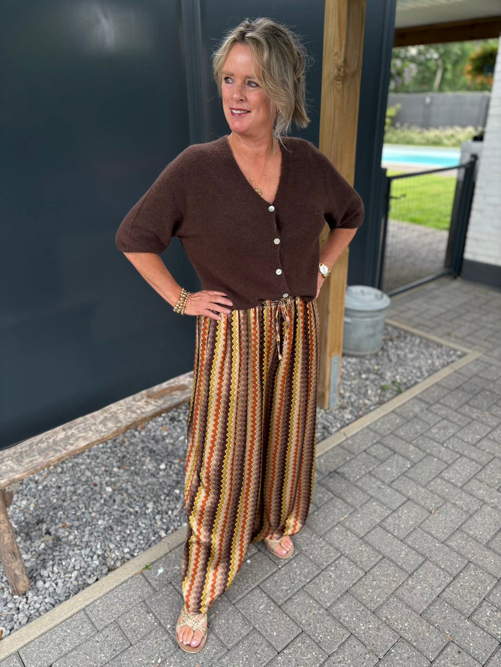 broek met print oker bruin en oranje