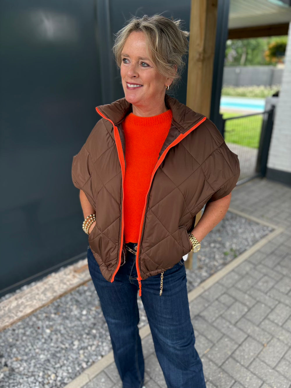bodywarmer bruin oranje rits