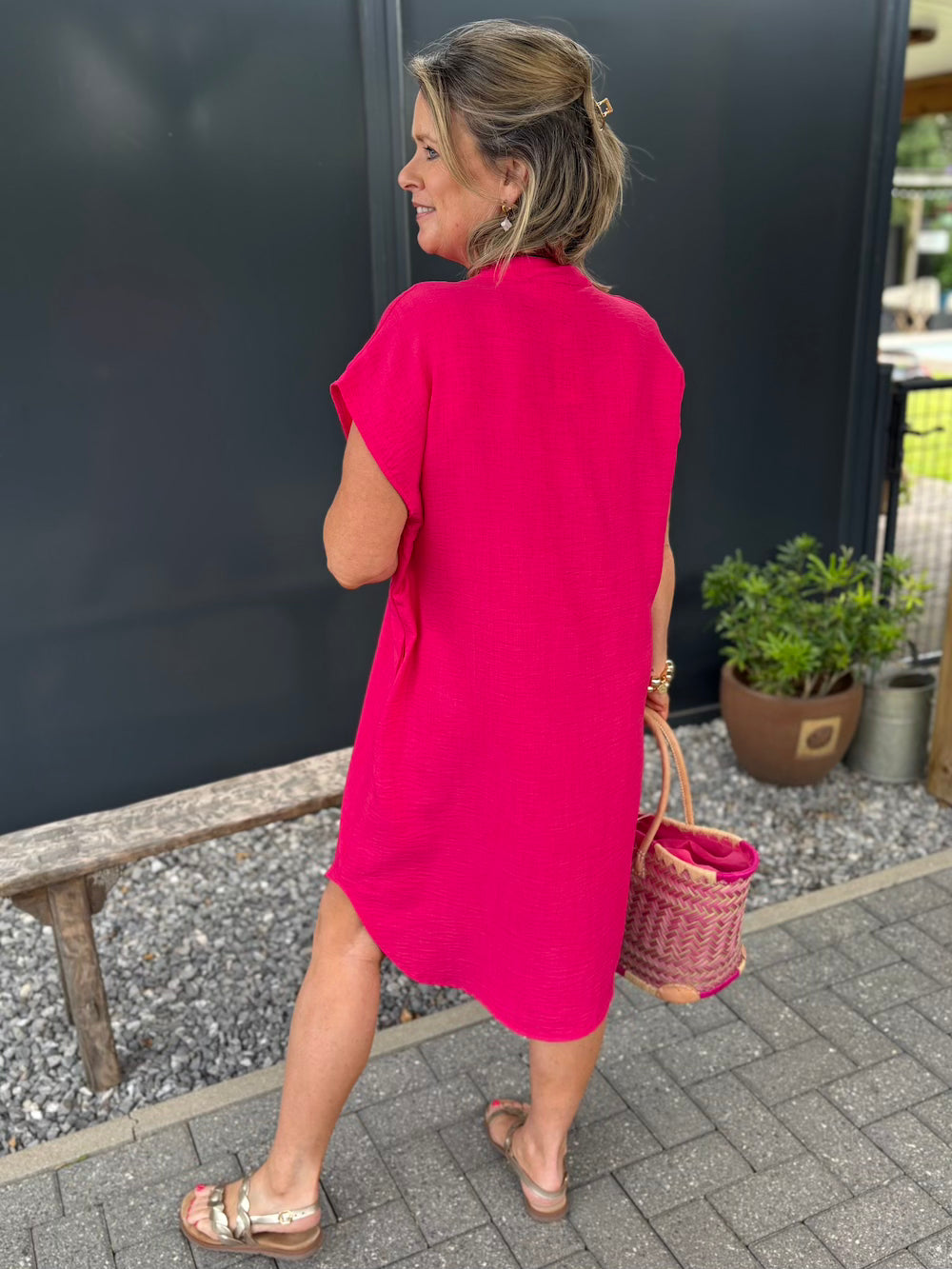 Mouwloos jurkje fuchsia doorknoop model