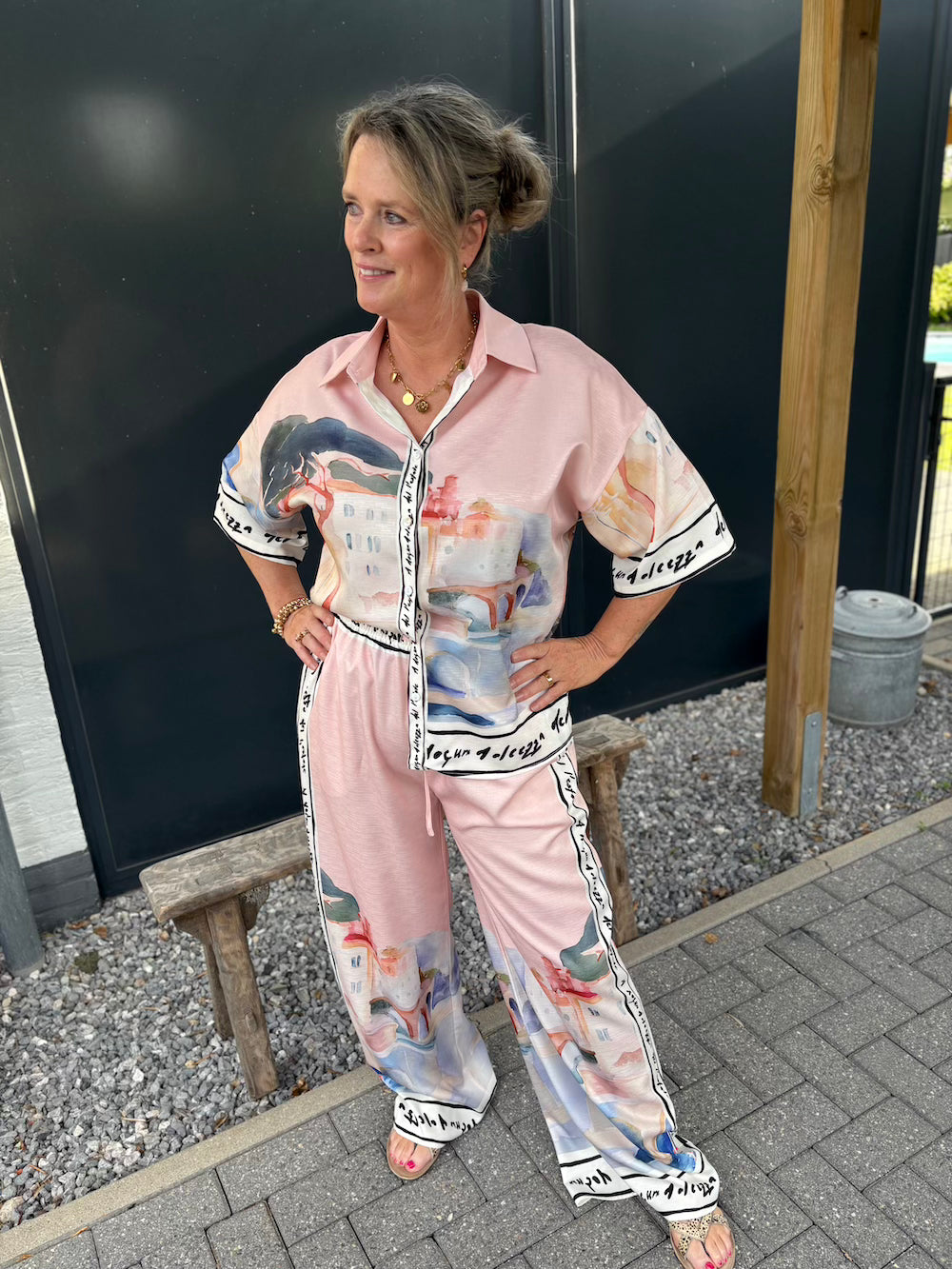Set broek en blouse met print roze