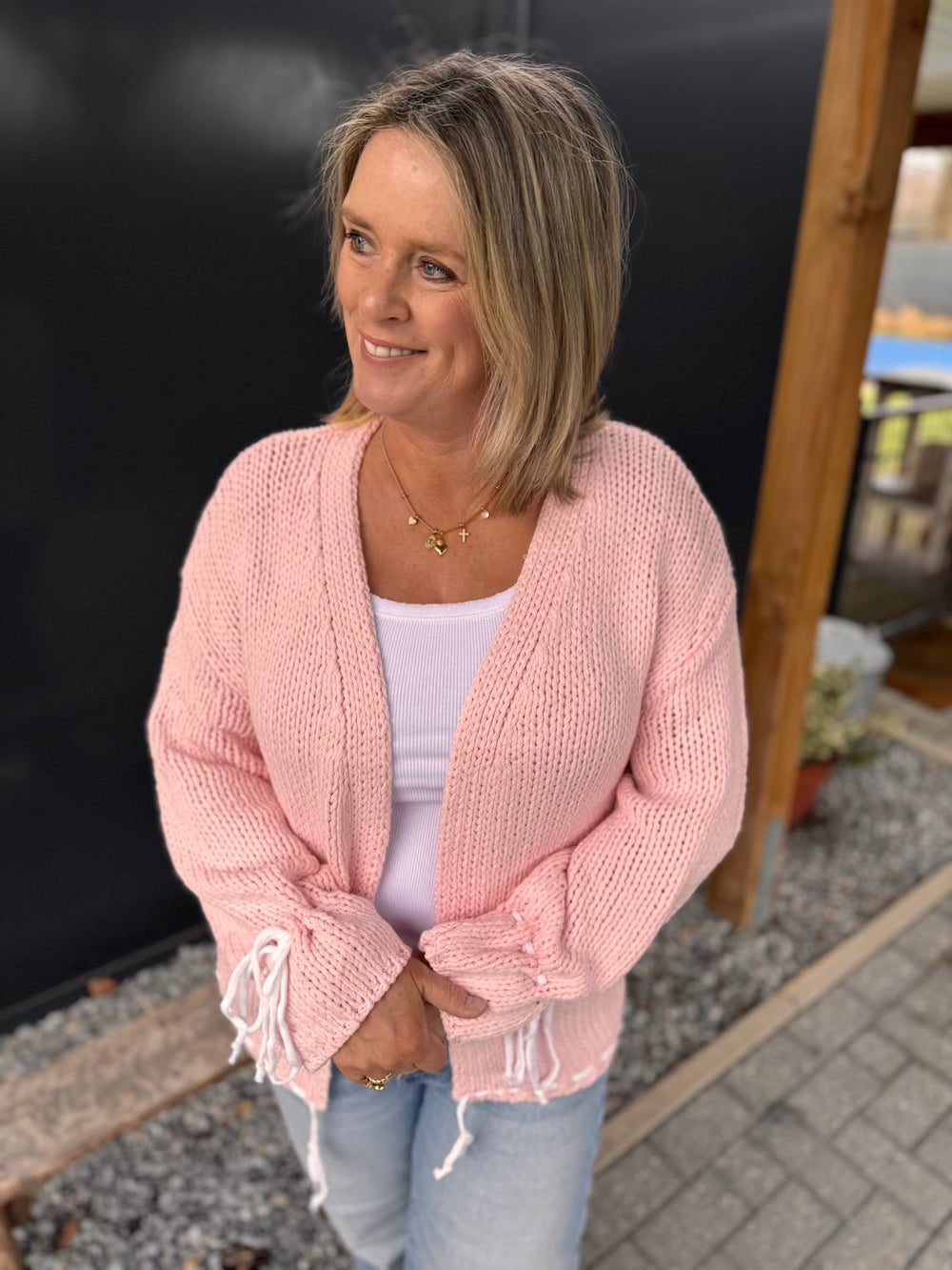 Vest roze met striklintjes