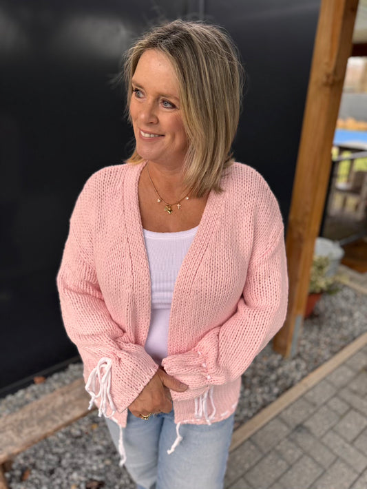 Vest roze met striklintjes