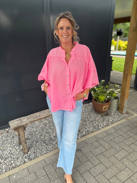 oversized blouse neon roze met broderie details