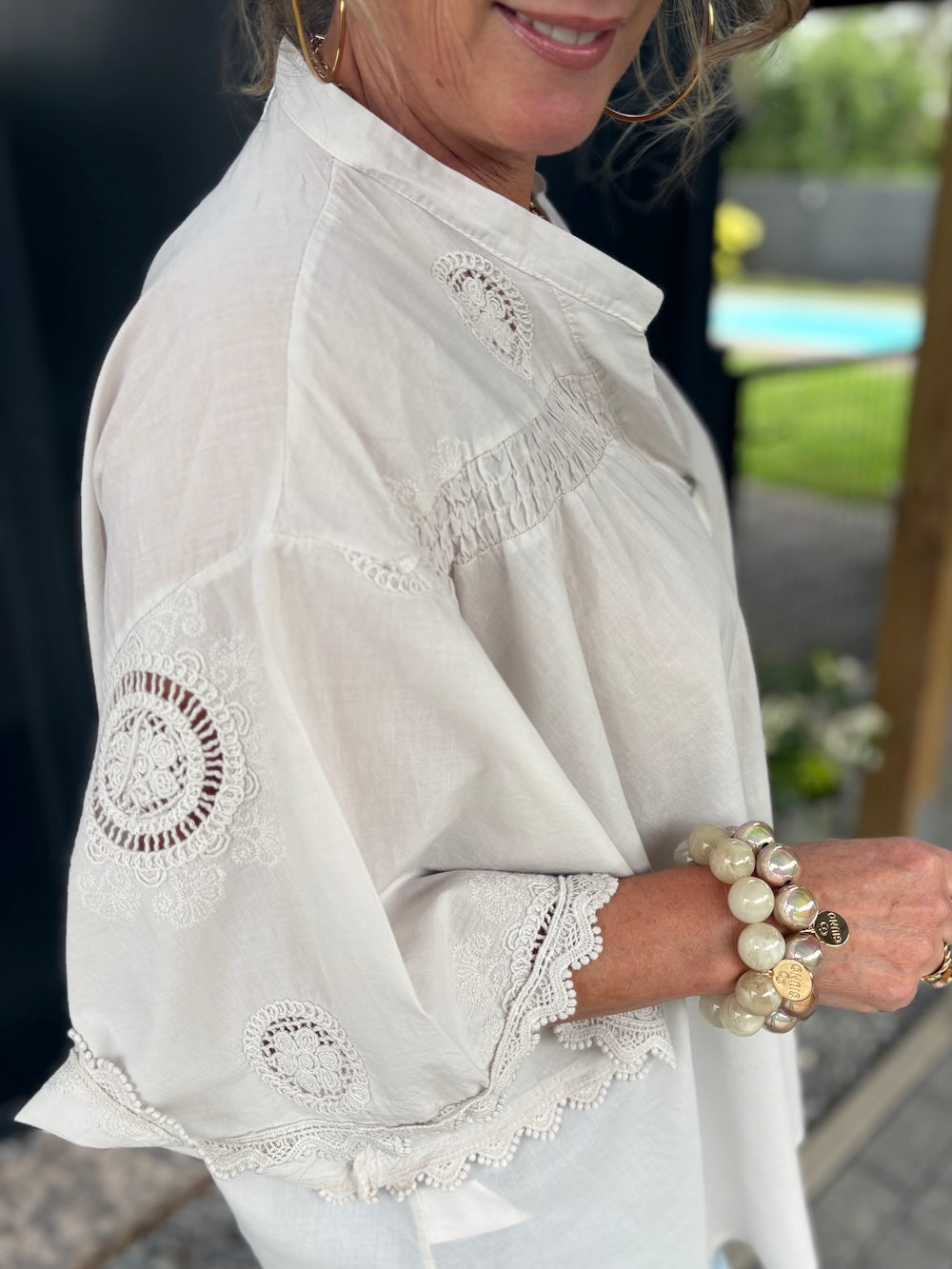Blouse super oversized met broderie details