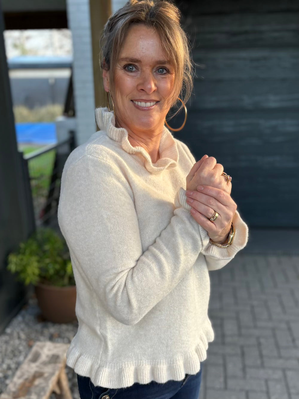 Trui met froezel details crème