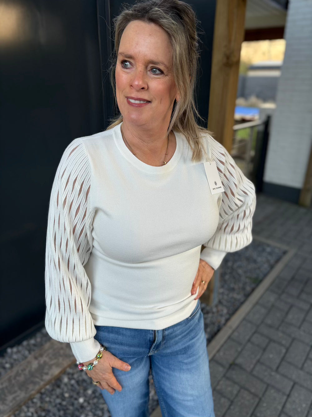 Trui met opengewerkte mouw roomwit