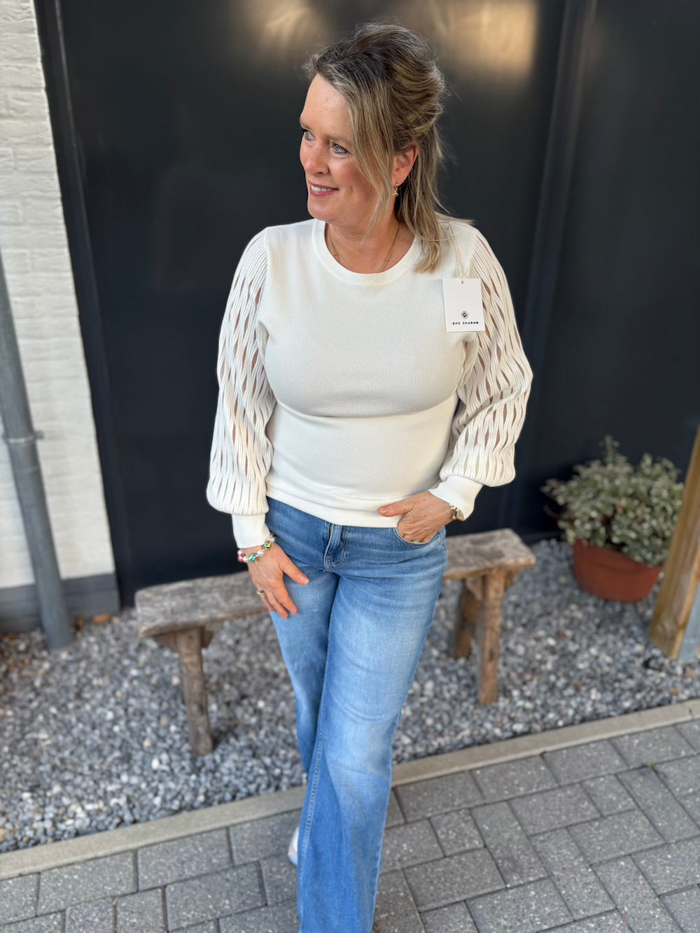 Trui met opengewerkte mouw roomwit