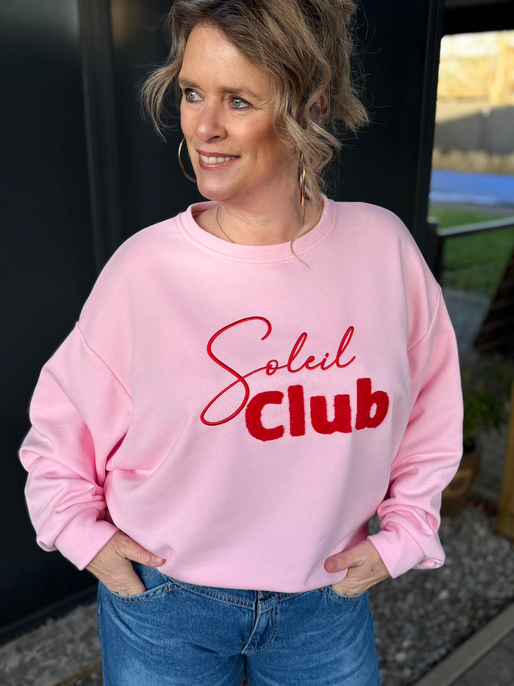Sweater soleil club roze