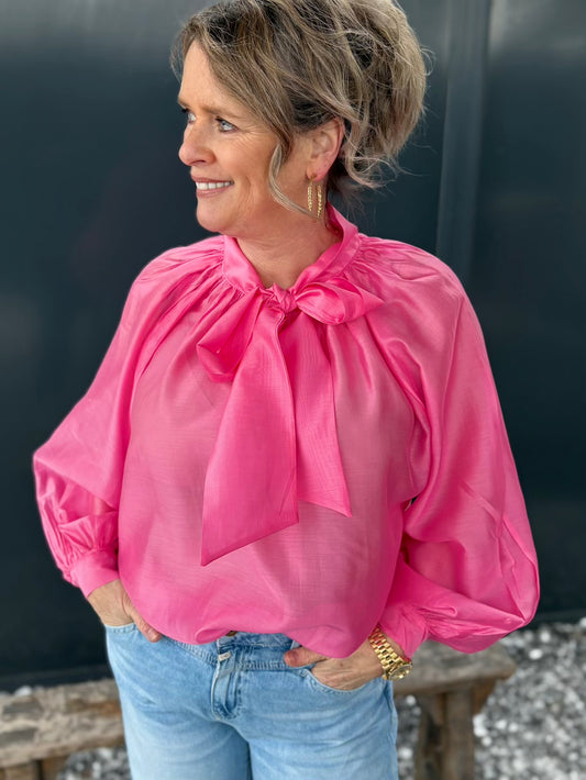 Blouse met striklint roze