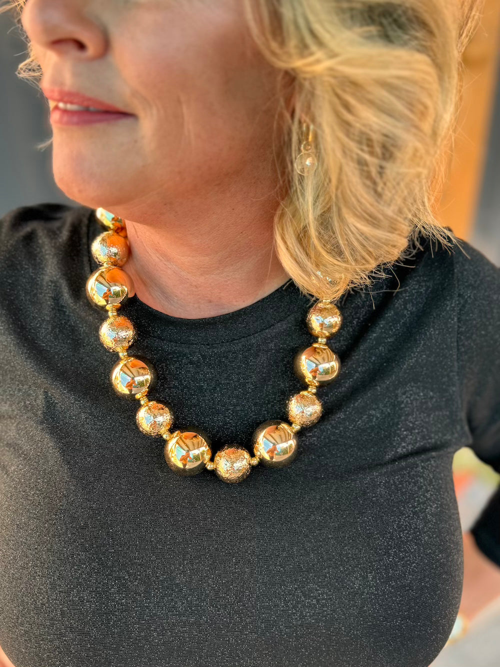Statement ketting gouden bollen