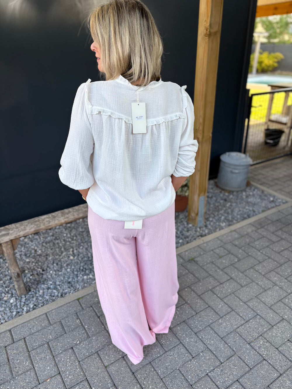 Broek zachtroze met plooien