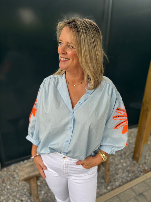 blouse oversied met neon oranje bloem