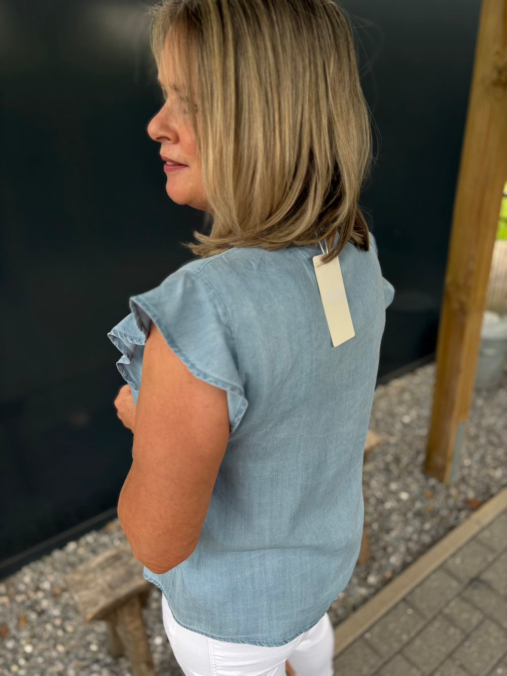 Jeansbloesje mouwloos met ruffle