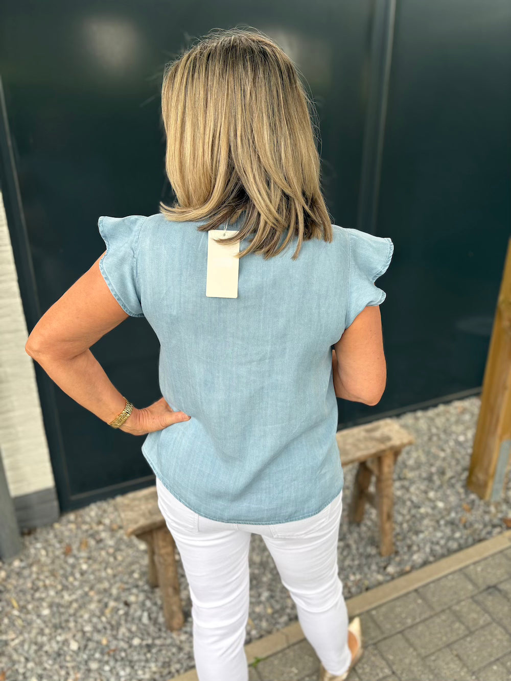 Jeansbloesje mouwloos met ruffle