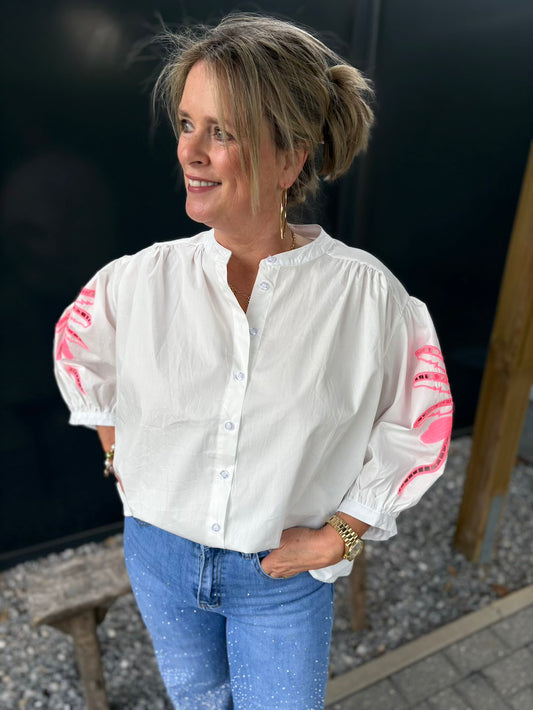 Wijde blouse wit met neon bloem op de mouw