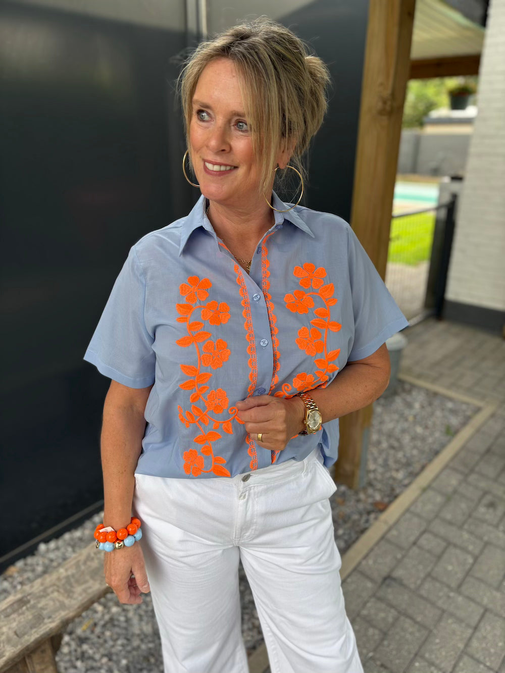 blouse blauw met oranje bloemen