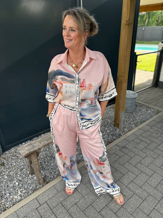 Set broek en blouse met print roze