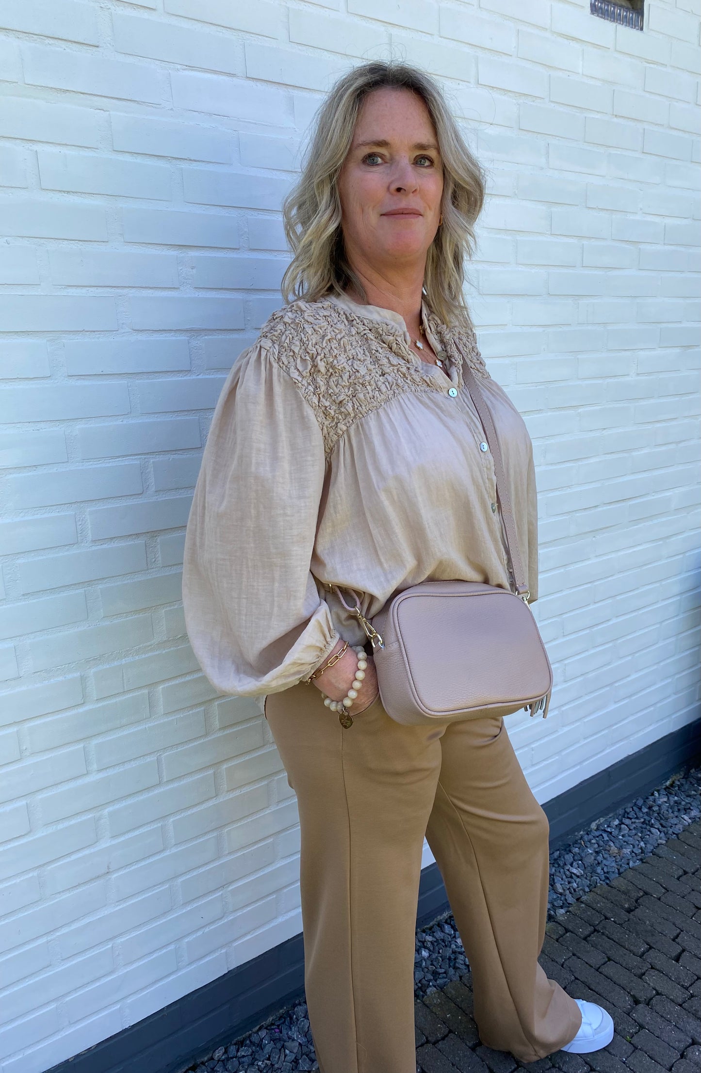Tasje echt leer met kwast beige