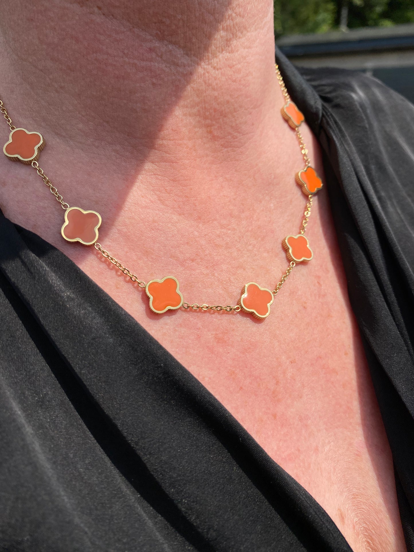 Ketting stainless klavertjes oranje